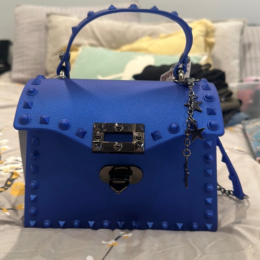 Most wanted blue rubber mini bag.